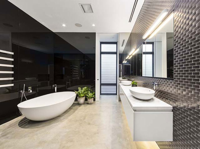 Bathroom with free standing bathrub and basin sinks